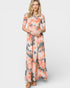 Woman wearing a floral dress on a white background