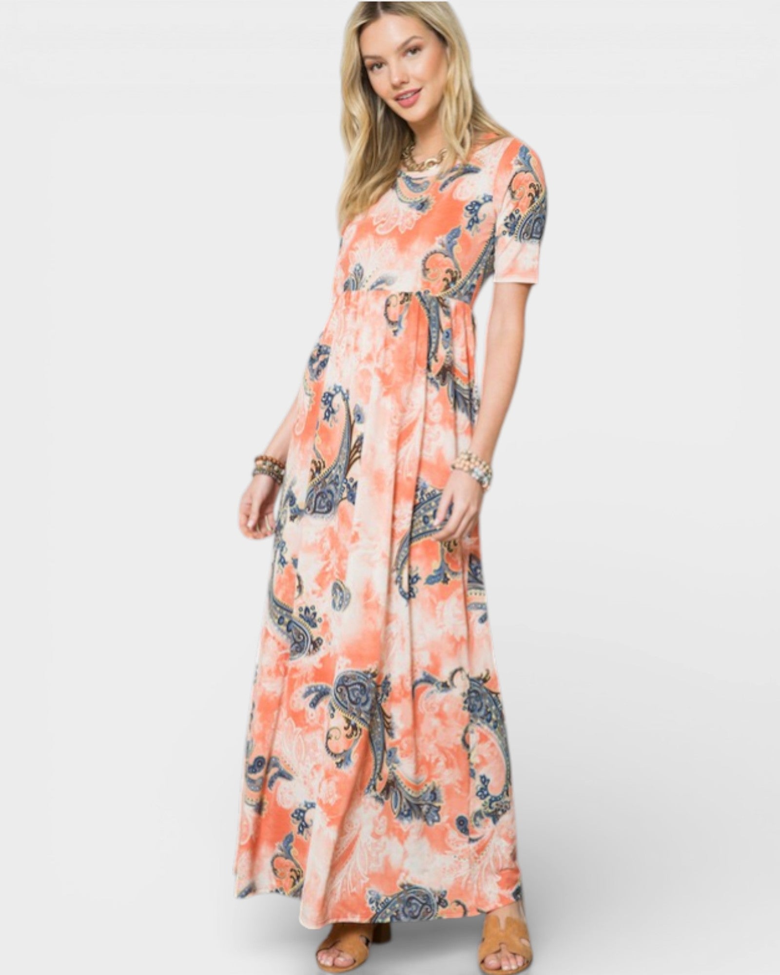 Woman wearing a floral dress on a white background