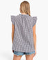 A woman shown from the back wearing a black and white gingham check top with ruffled cap sleeves and denim shorts against a plain white background.