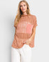 Blusa de crochet transparente con cuello alto en color óxido