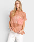 Blusa de crochet transparente con cuello alto en color óxido