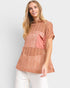 Blusa de crochet transparente con cuello alto en color óxido