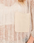 Close-up of a textured sweater with a pocket