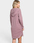 Woman wearing a pink hooded dress on a white background