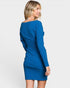 Woman wearing a blue dress on a white background