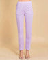 Lavender pants worn by a person on a beige background
