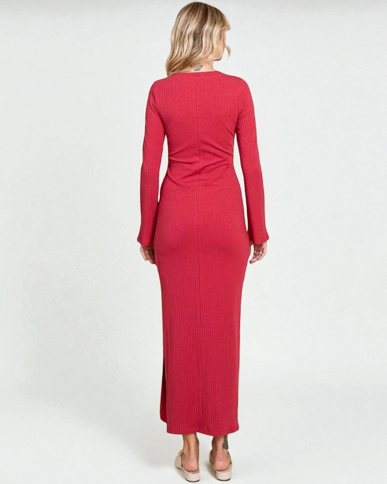 Red dress worn by a person on a white background
