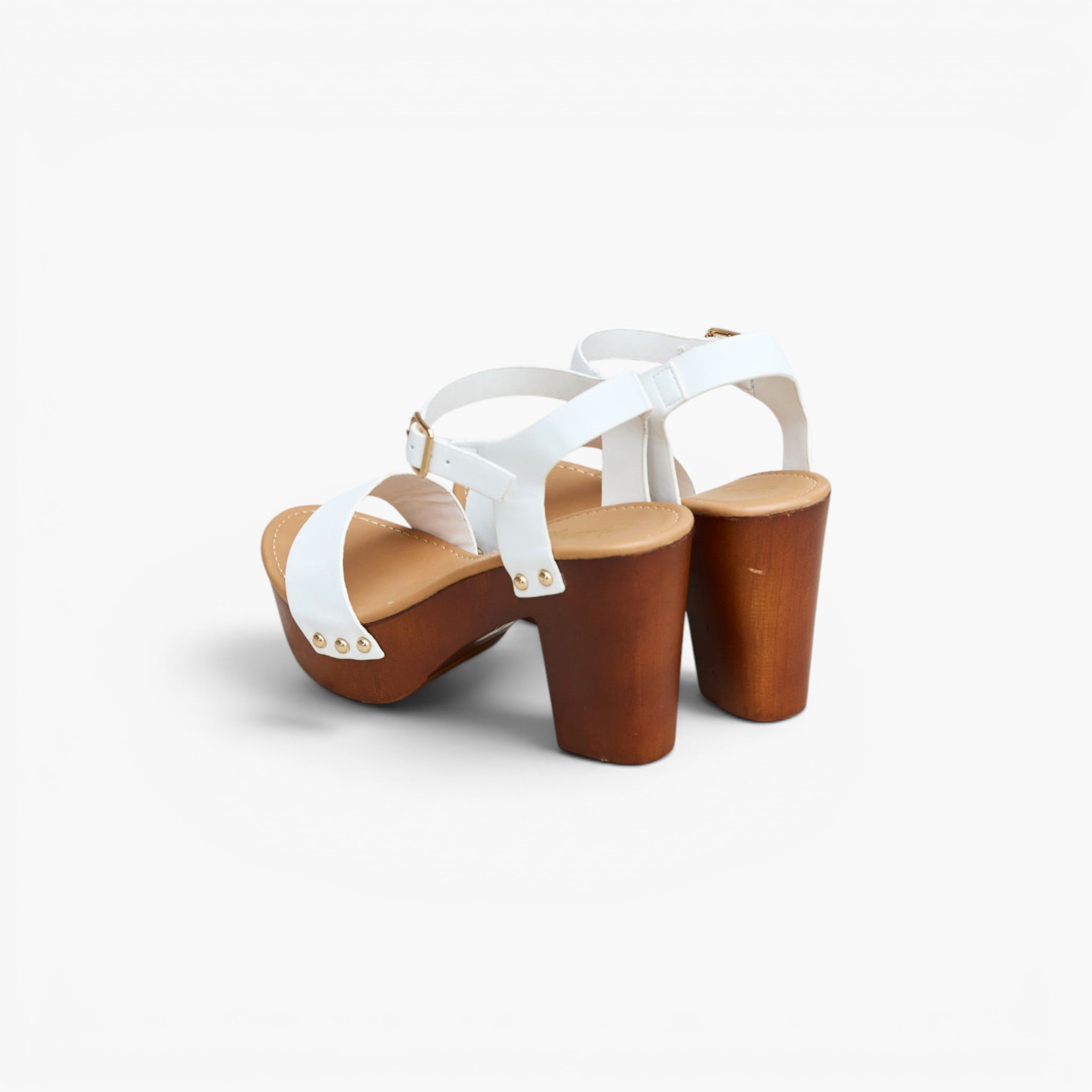 A pair of women's platform sandals with white straps and brown wooden block heels, shown from a side-rear angle on a light gray background.