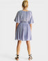 Person wearing a light blue striped dress on a white background