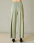 Light green cargo pants on a neutral background