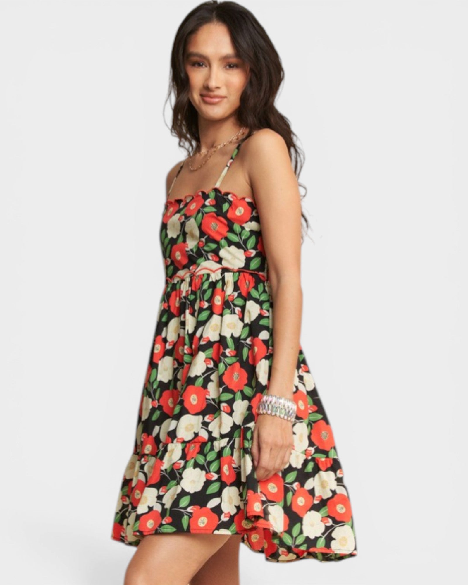 Woman wearing a floral dress on a white background