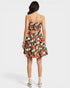 Woman wearing a floral dress on a white background