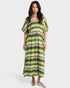 Woman wearing a green and white striped dress on a white background