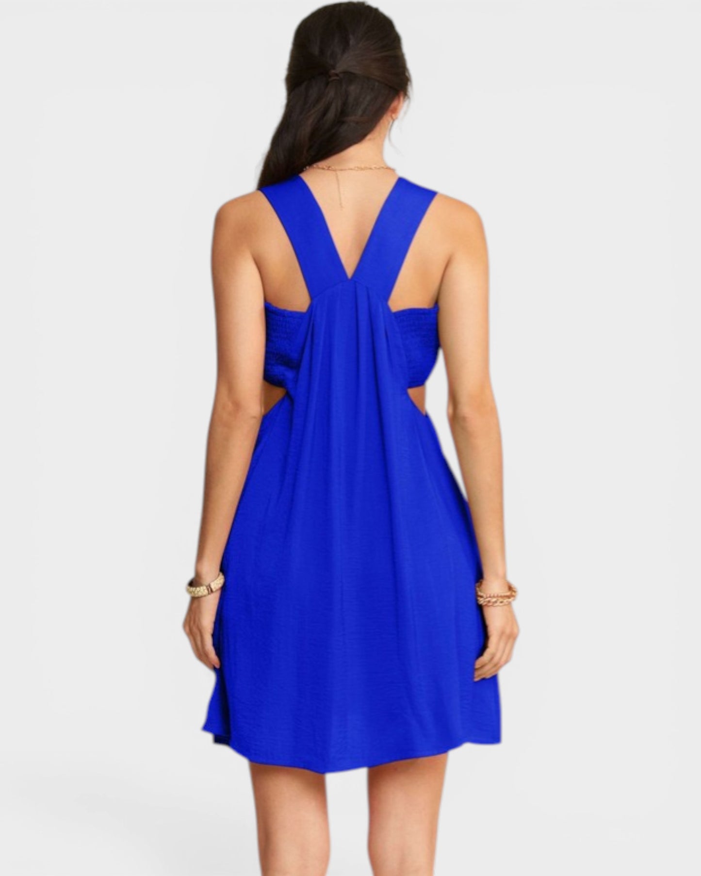 Blue dress with cut-out back on a white background