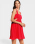 Woman wearing a red dress on a white background