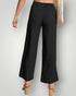 Black wide-leg pants worn by a person on a light gray background