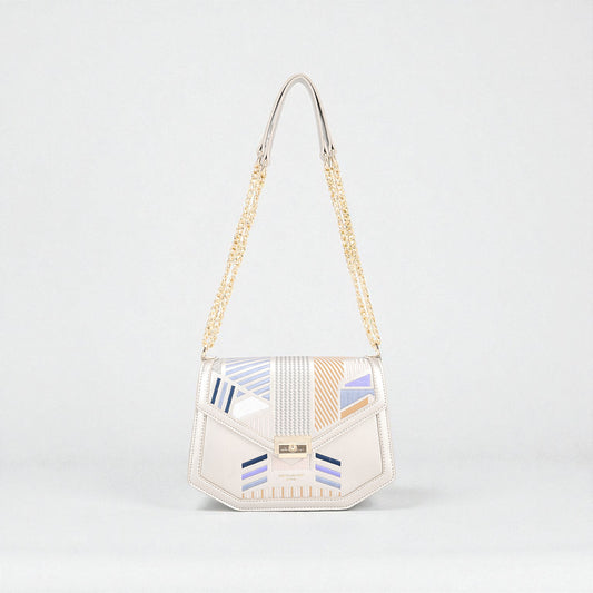 Handbag with geometric pattern on a light gray background