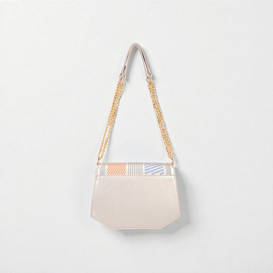 Beige handbag with a chain strap on a light gray background