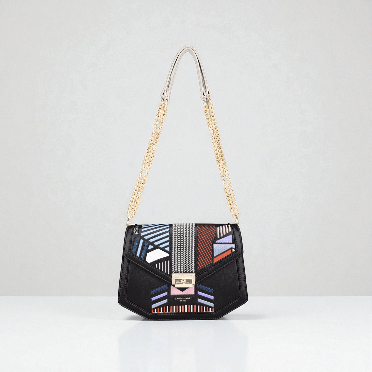 Black handbag with geometric pattern and gold chain strap on a white background