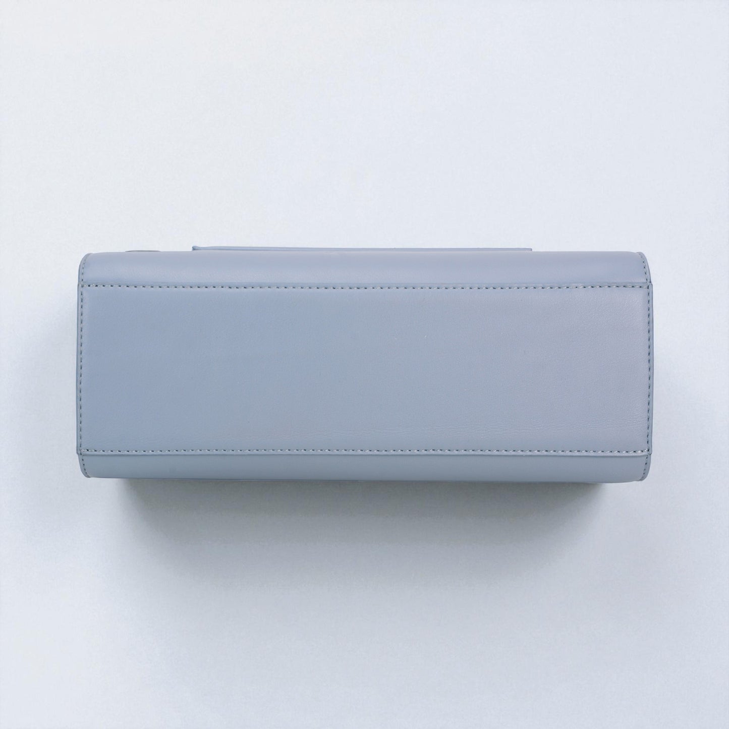 Light blue wallet on a light gray background