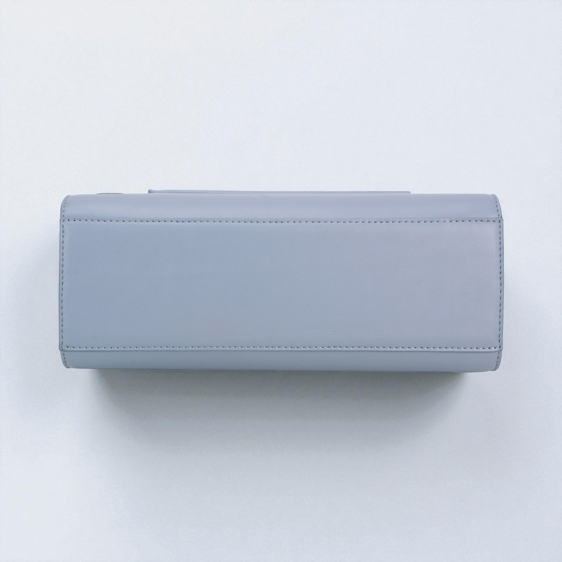 Light blue wallet on a light gray background
