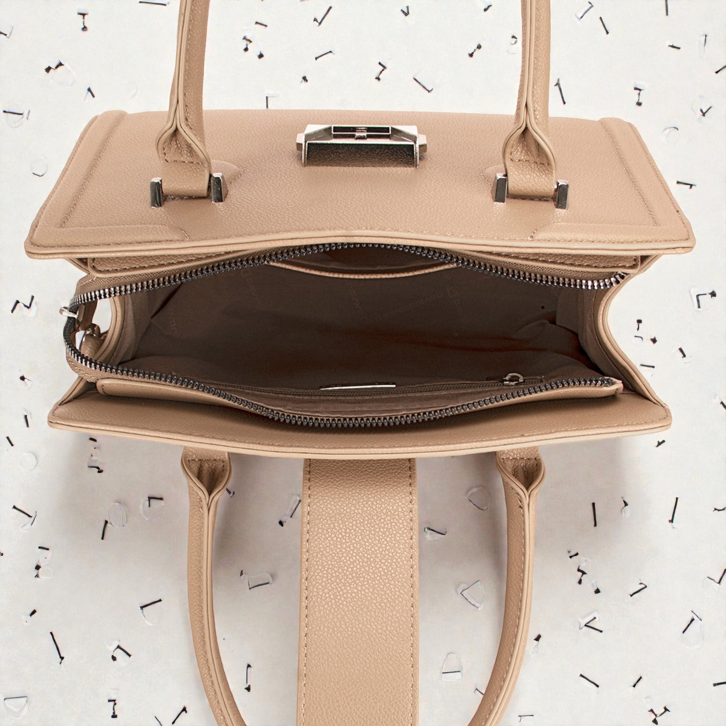 Beige handbag with open front compartment on a light background