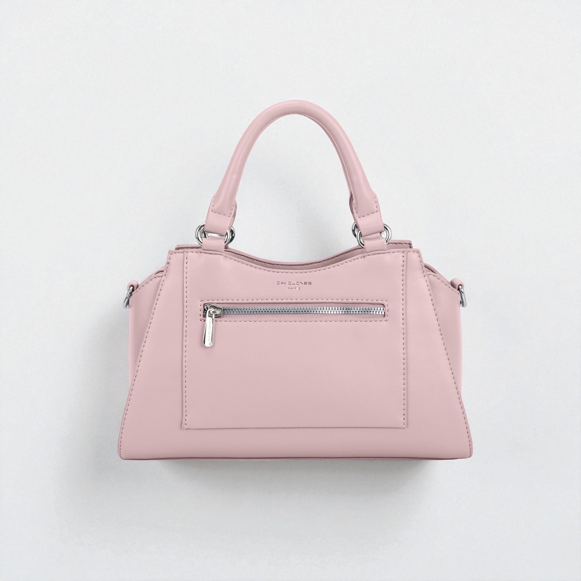 Pink handbag with a visible brand logo on a light gray background