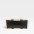 Clutch bag with woven design and black accents on a white background