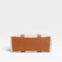 Rectangular ottoman with brown leather and woven design on a white background