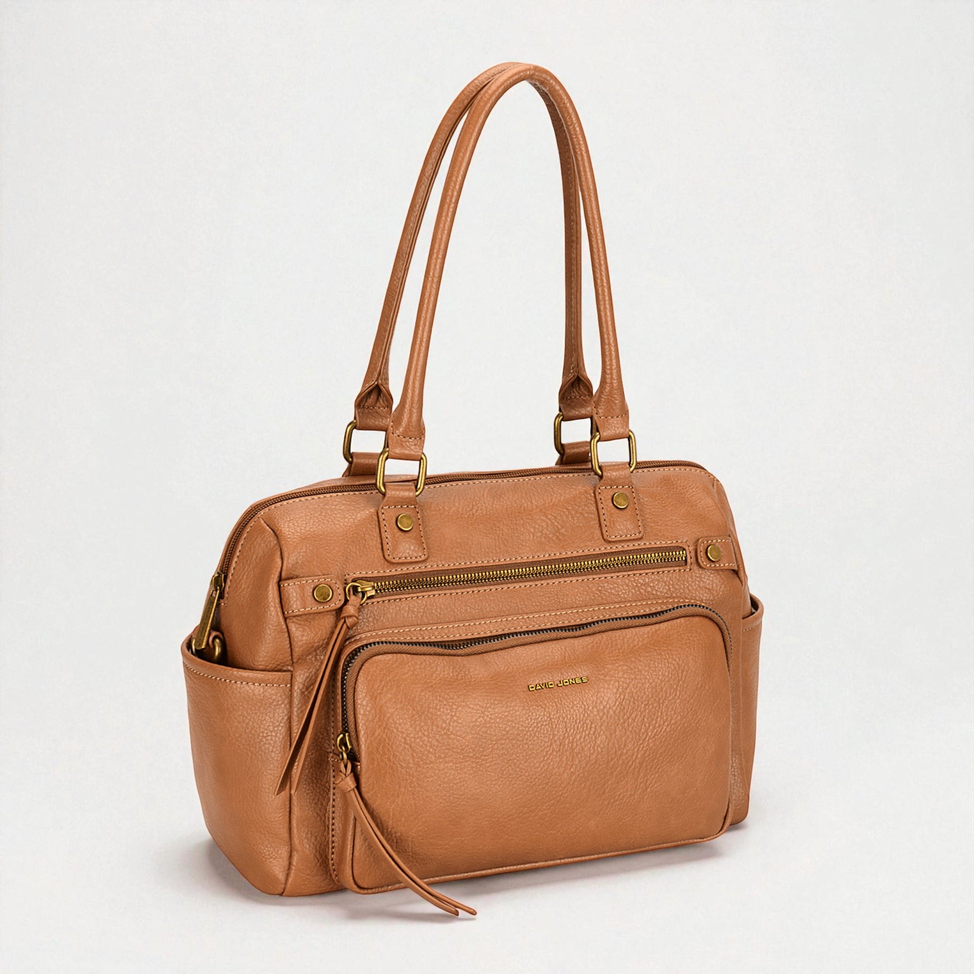 Brown leather handbag with multiple pockets and zippers on a white background
