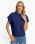 A woman modeling a navy blue short-sleeve knit sweater with a crew neck and ribbed trim, paired with blue jeans, against a plain white background.