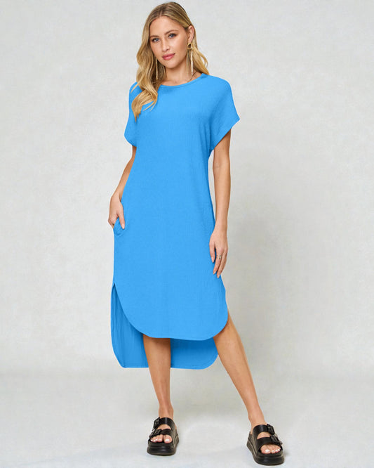 Woman wearing a blue dress on a white background