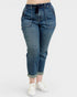 Blue jeans worn by a person on a white background