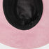 Close-up of a pink hat with a black interior