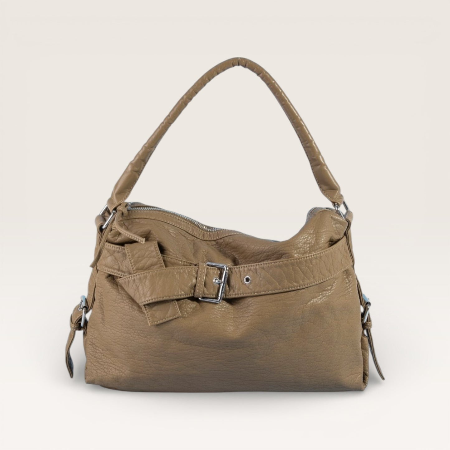 Brown leather handbag with a belt detail on a beige background
