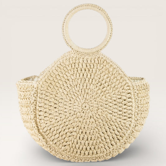 Beige woven handbag with round handles on a light gray background