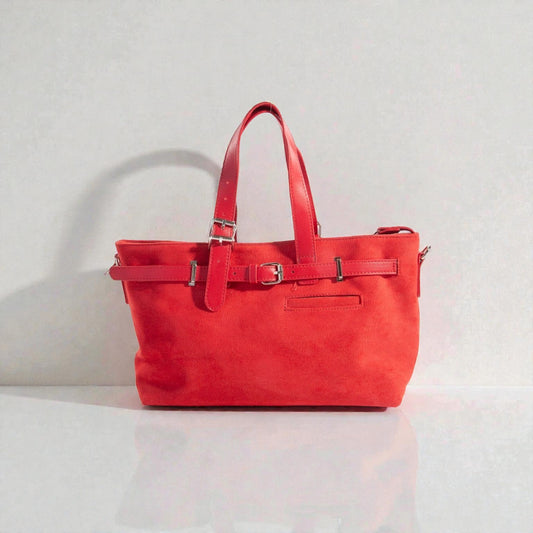 Red handbag on a light gray background