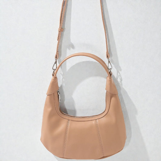 Beige handbag on a white background