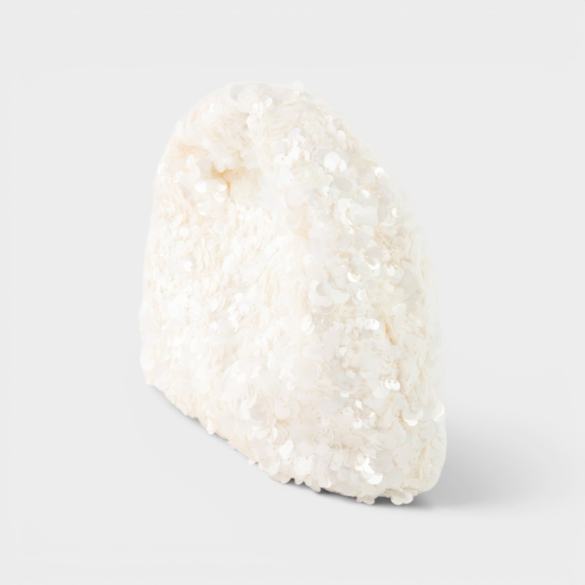 White textured object on a light gray background