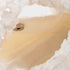close-up of white sequin handbag