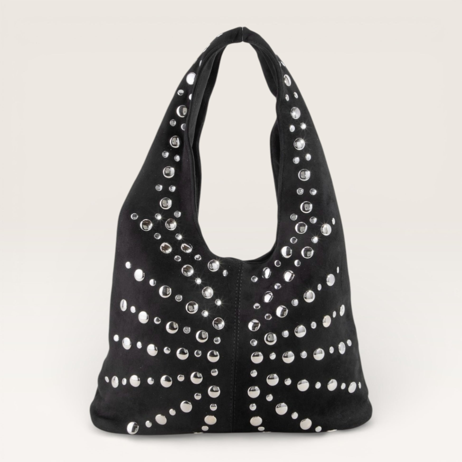 Black handbag with silver studs on a light gray background