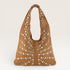 Brown bag with silver studs on a beige background
