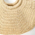 Close-up of a beige knitted collar on a white background