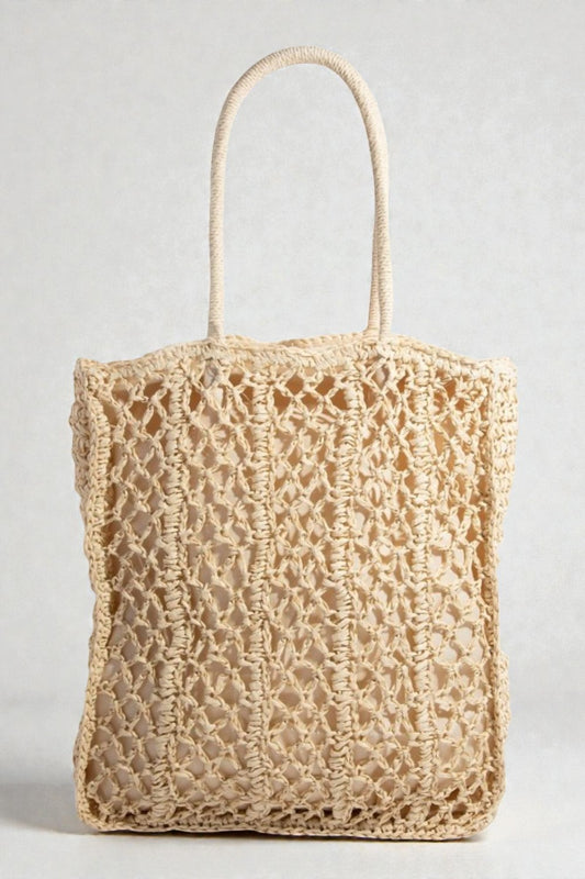 Beige woven tote bag on a light gray background