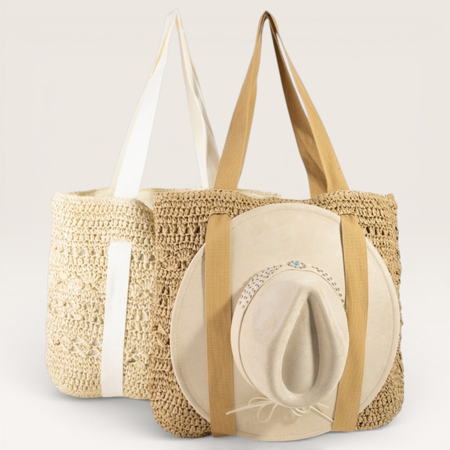 Woven straw tote bag with a beige hat on a light gray background