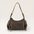 Brown leather handbag with multiple pockets on a light beige background