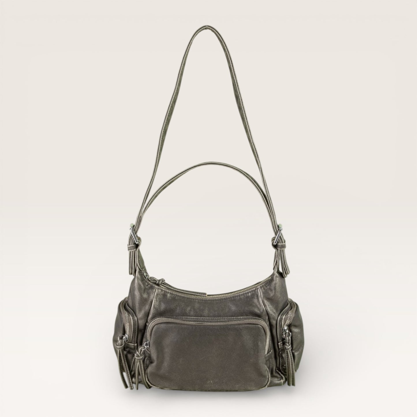 Gray handbag with multiple pockets on a light gray background