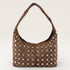 Brown handbag with silver studs on a white background