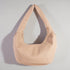 Beige handbag on a light gray background