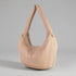 Beige handbag on a gray background